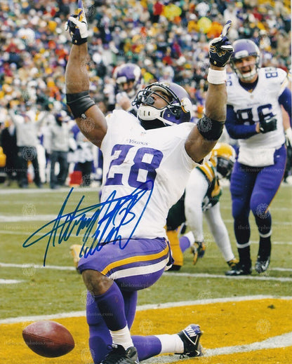 Iconic signed photograph of Adrian Peterson with the Minnesota Vikings curated by The Iconic Photos