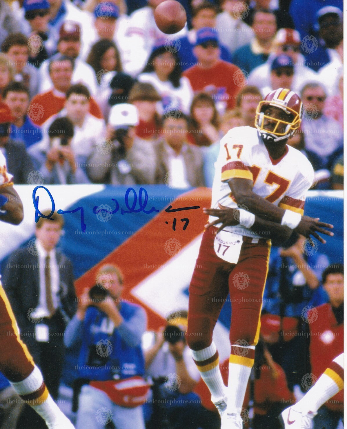Iconic signed photograph of Super Bowl-winning quarterback Doug Williams with the Washington Redskins curated by The Iconic Photos