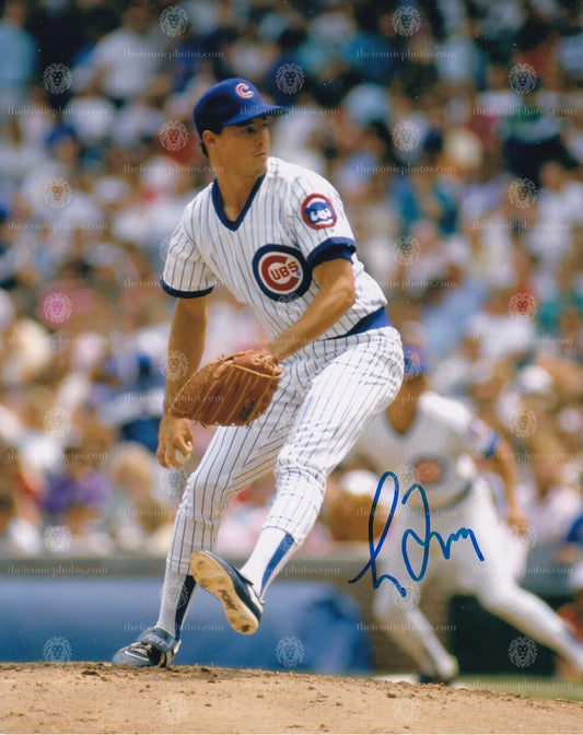 Iconic signed photograph of MLB Hall of Fame pitcher Greg Maddux with the Chicago Cubs curated by The Iconic Photos