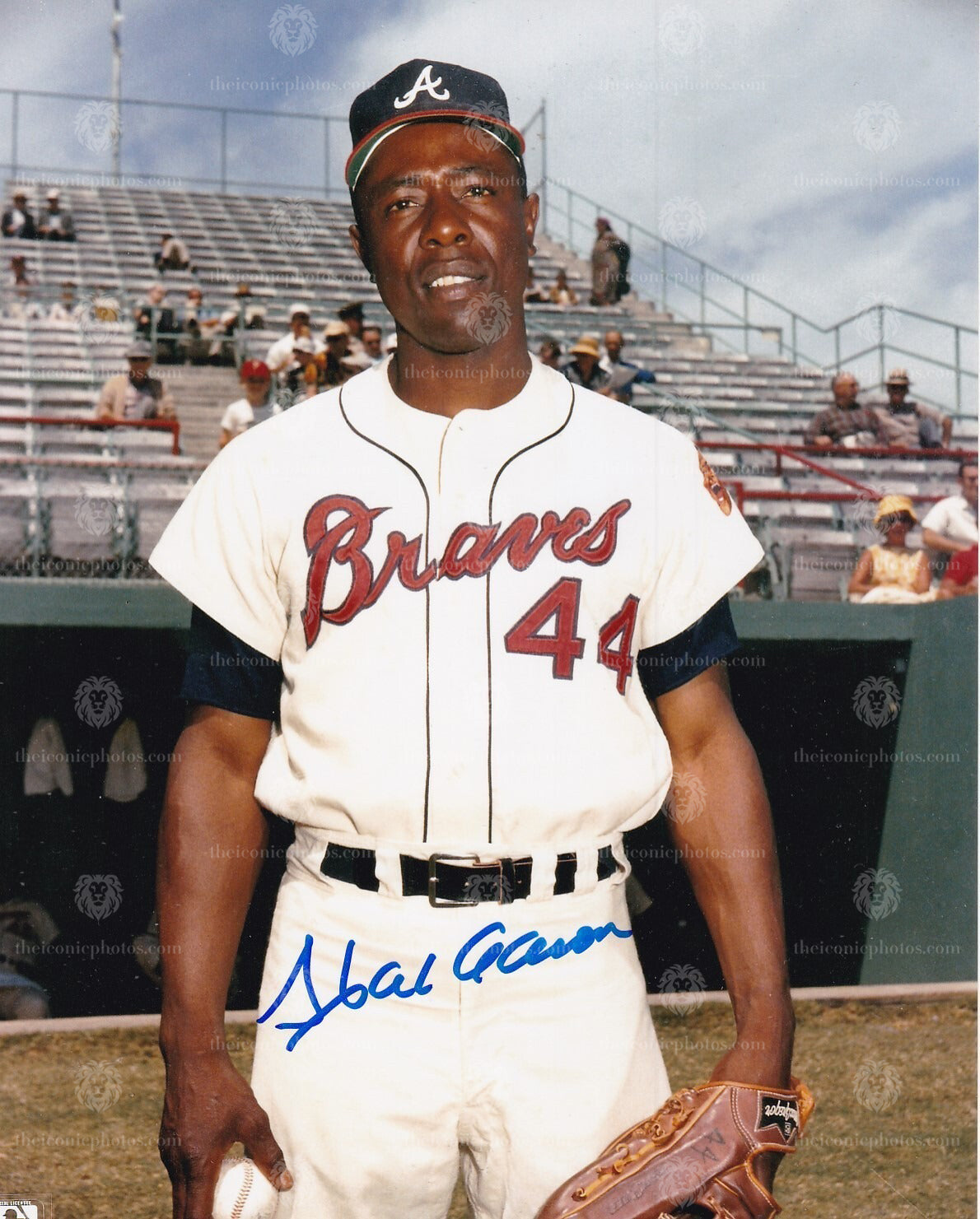 Iconic signed photograph of MLB legend Hank Aaron with the Atlanta Braves curated by The Iconic Photos