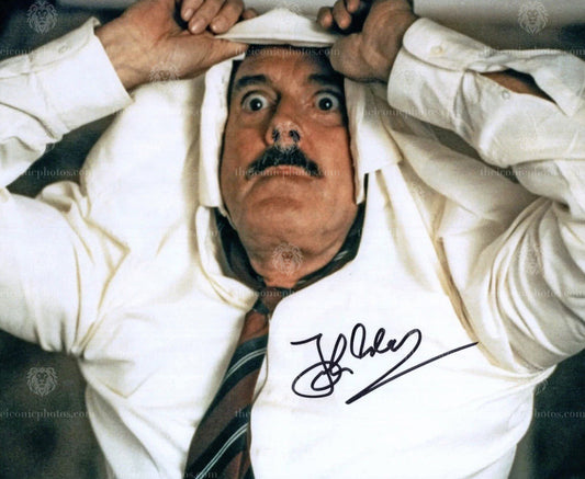 Iconic signed photograph of John Cleese from Fawlty Towers curated by The Iconic Photos